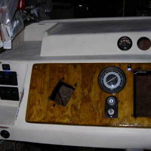 I decided to keep the wood for the instruments until after sea trials, then I will swap to aluminum. Oak stain and three coats of clear. I want to get