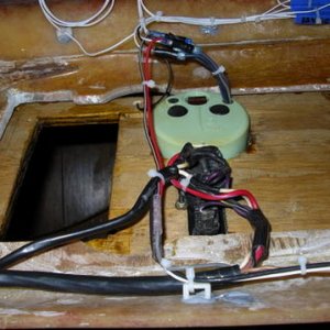 Behind main panel wiring.