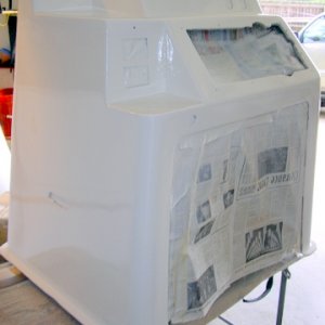 Shot the center console this morning. Applied a two part epoxy primer first and painted with Interlux Brightside. I tried to brush it first (bad idea)