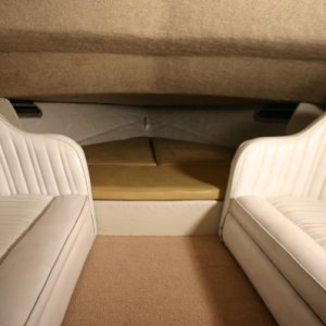 Sleecraft Executive cuddy, room for 6 adults sitting, 4 real comfy and 2 sleeping in bed area, we fill the walkway with outdoor furniture couch pillow