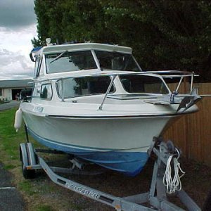 MVC 007S 20 ft Glasply best on the big water. Cutty Cabin 115 OB.