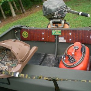 new transom. 

note: that is definitely not a 25 hp either...that was an old Johnson 9.5 i had laying around.