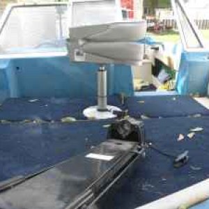 Bowrider area has storage below, trolling motor and seat have been removed.