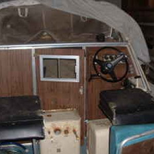 Ugly rusty fuel tanks removed sitting on the floor