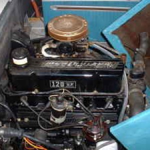 Could tell from this pic that it had been winterized from coolant hose turned up to pour in antifreeze.