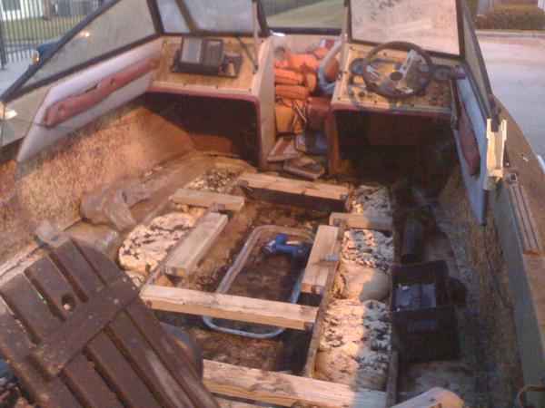 041
floor removed and stringers were in ok shape.treated 2x4's to strengthen up the new floor