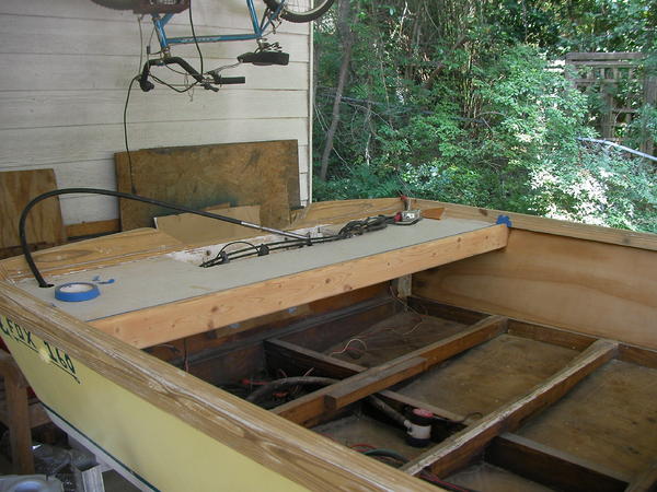 later in the project I ended up pulling of the white piece of vinyl, used a stripper to remove the adhesive, and varnished the ply under it.  So glad 