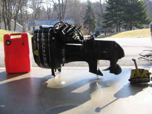 This is the 77 Mecury 402 (40 hp) with controls and a full tank of gas and that is how I bought it.  The guy even delivered it for me to my place.