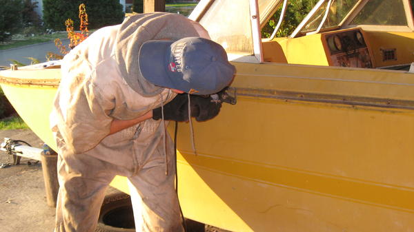 This picture I got the trim off and I'm starting to cut the top and bottom apart. Once I get the top off I can get at the floor better.